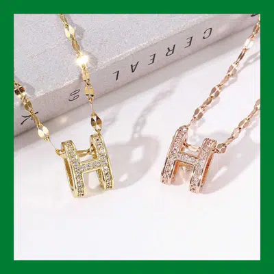 Shop the Gold Plated H Pendant Necklace from buyonebd. A sleek, modern, and stylish necklace featuring a gold-plated H pendant. Perfect for adding a touch of sophistication to any outfit. Available in Bangladesh.